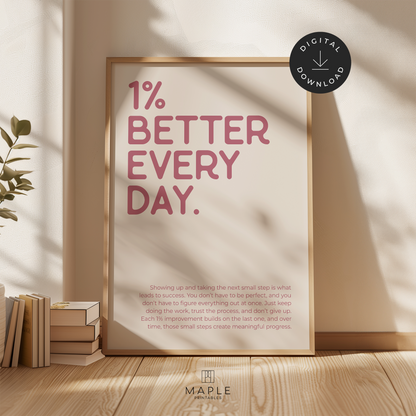 Motivational poster with quote '1% Better Every Day' in pink letters on a beige background. Minimalist style. Shown in a wood frame leaning on a wall.